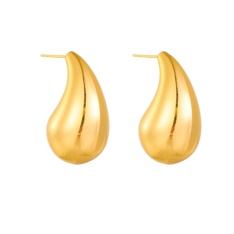 polished gold drop earrings close view