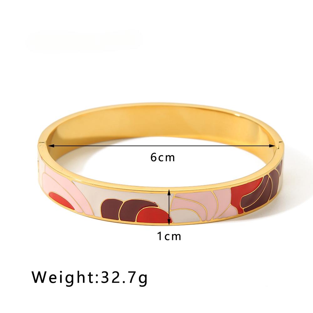 artistic gold tone bangle