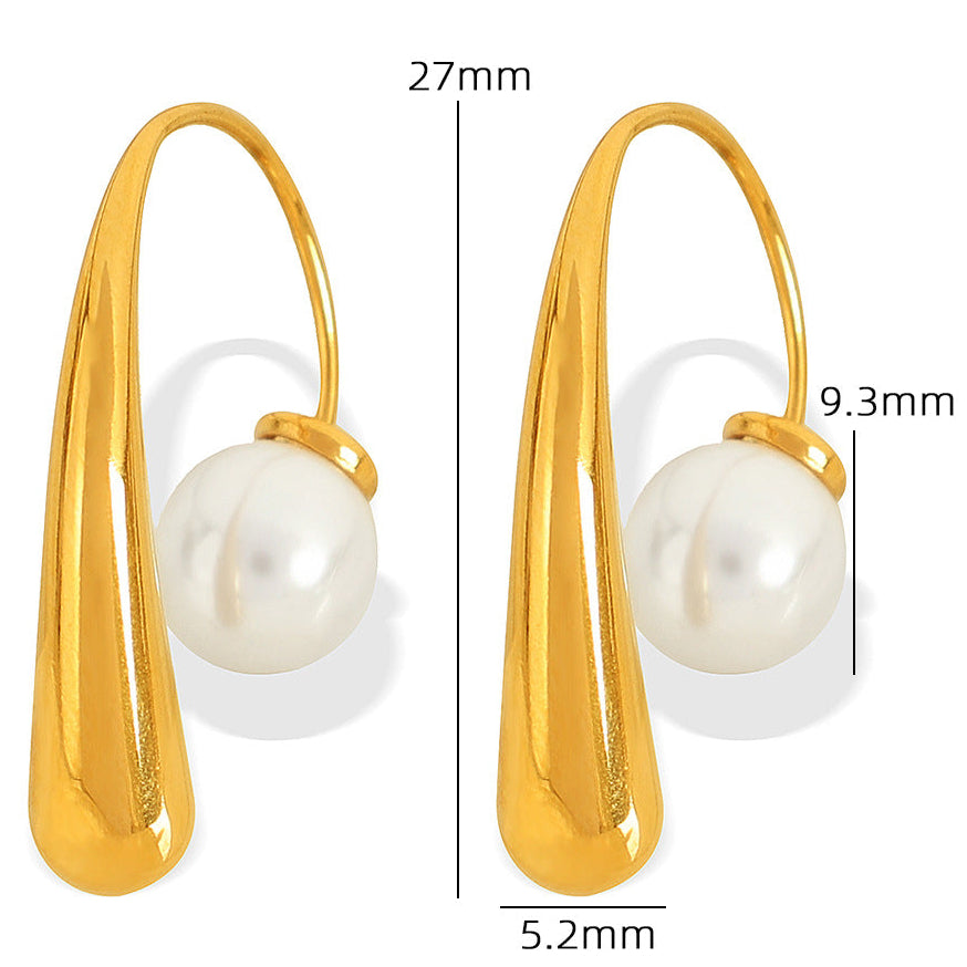 Gold earrings with pearls and measurements on a white background