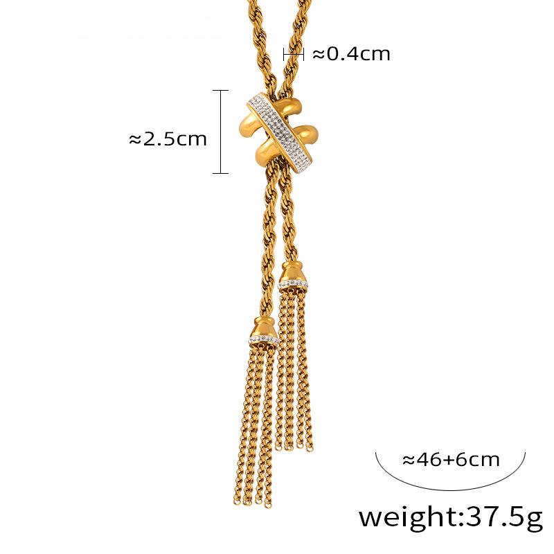 Gold necklace with tassels and measurements on a white background