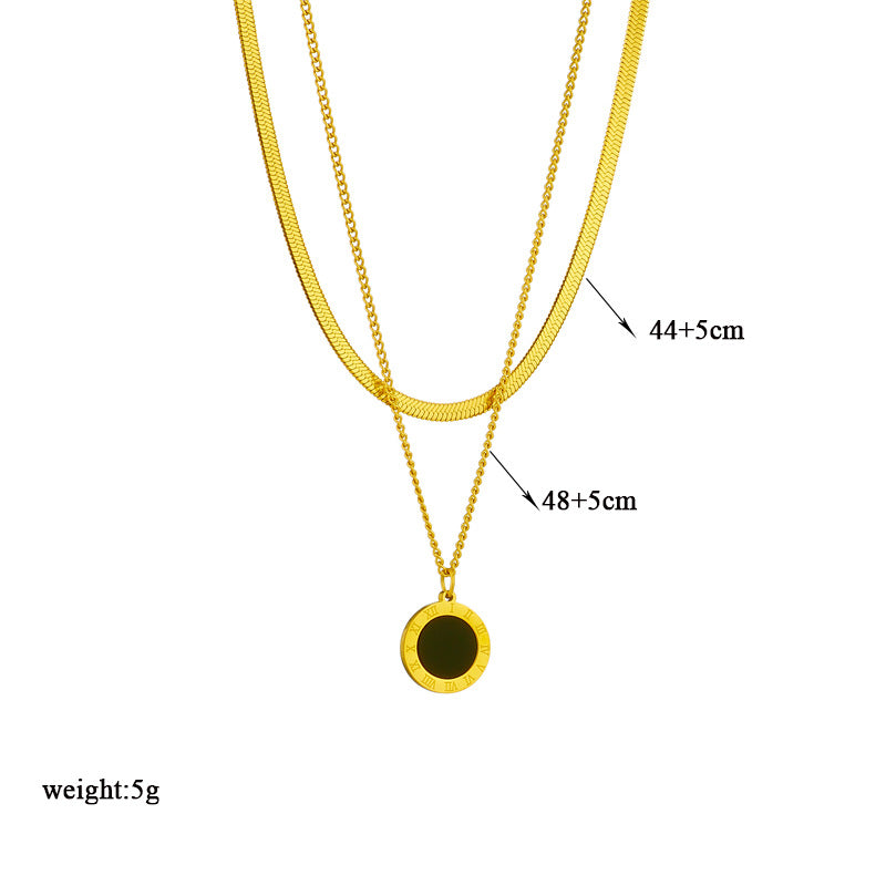 circular gold pendant close view