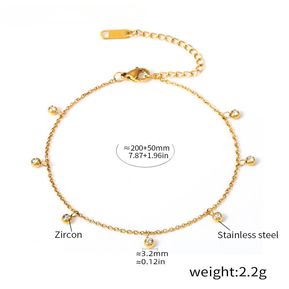 golden raindrop anklet worn