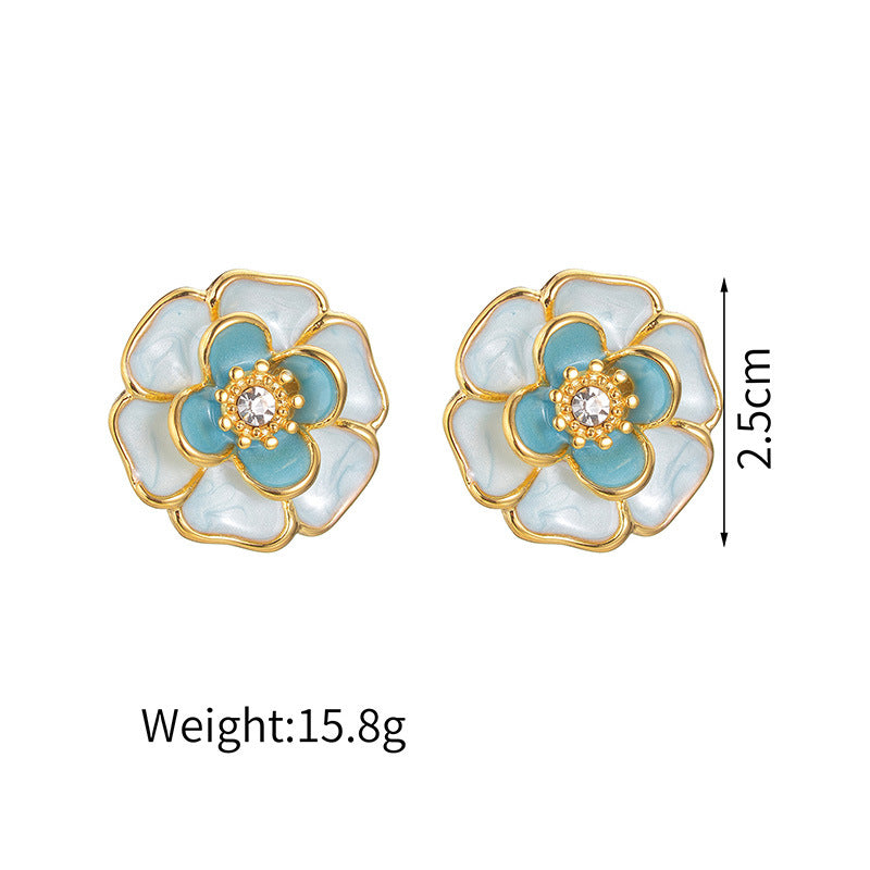 teal and cream floral earrings