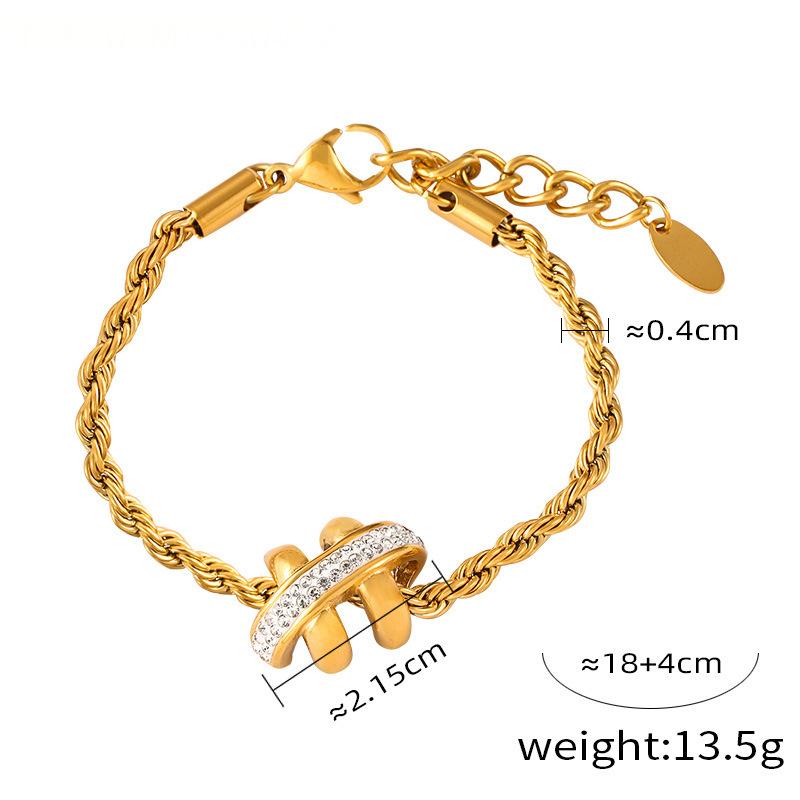 Gold bracelet with measurements and weight details on a white background