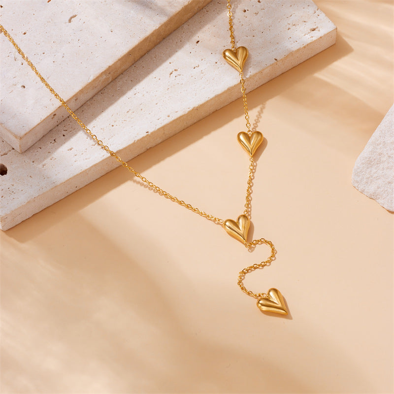 cascade of love gold heart necklace