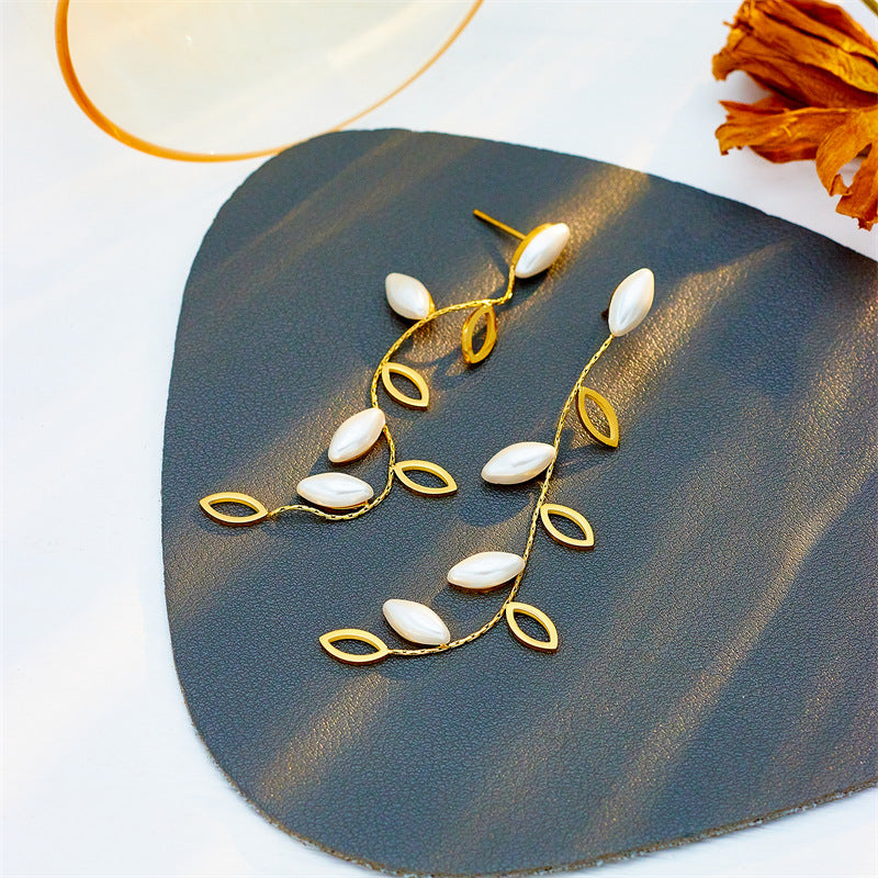 gold vine leaf drop earrings