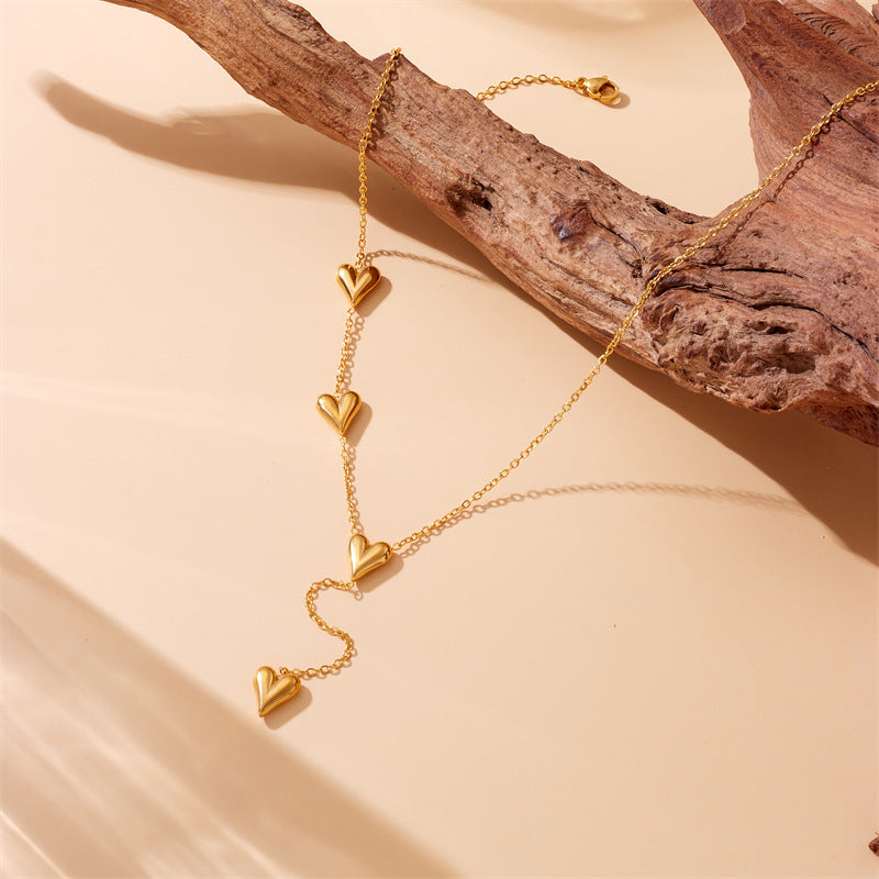 triple heart gold plated necklace