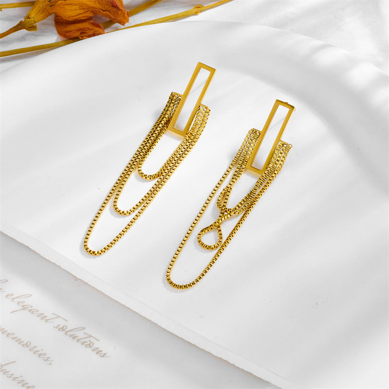 linear drop gold statement earrings