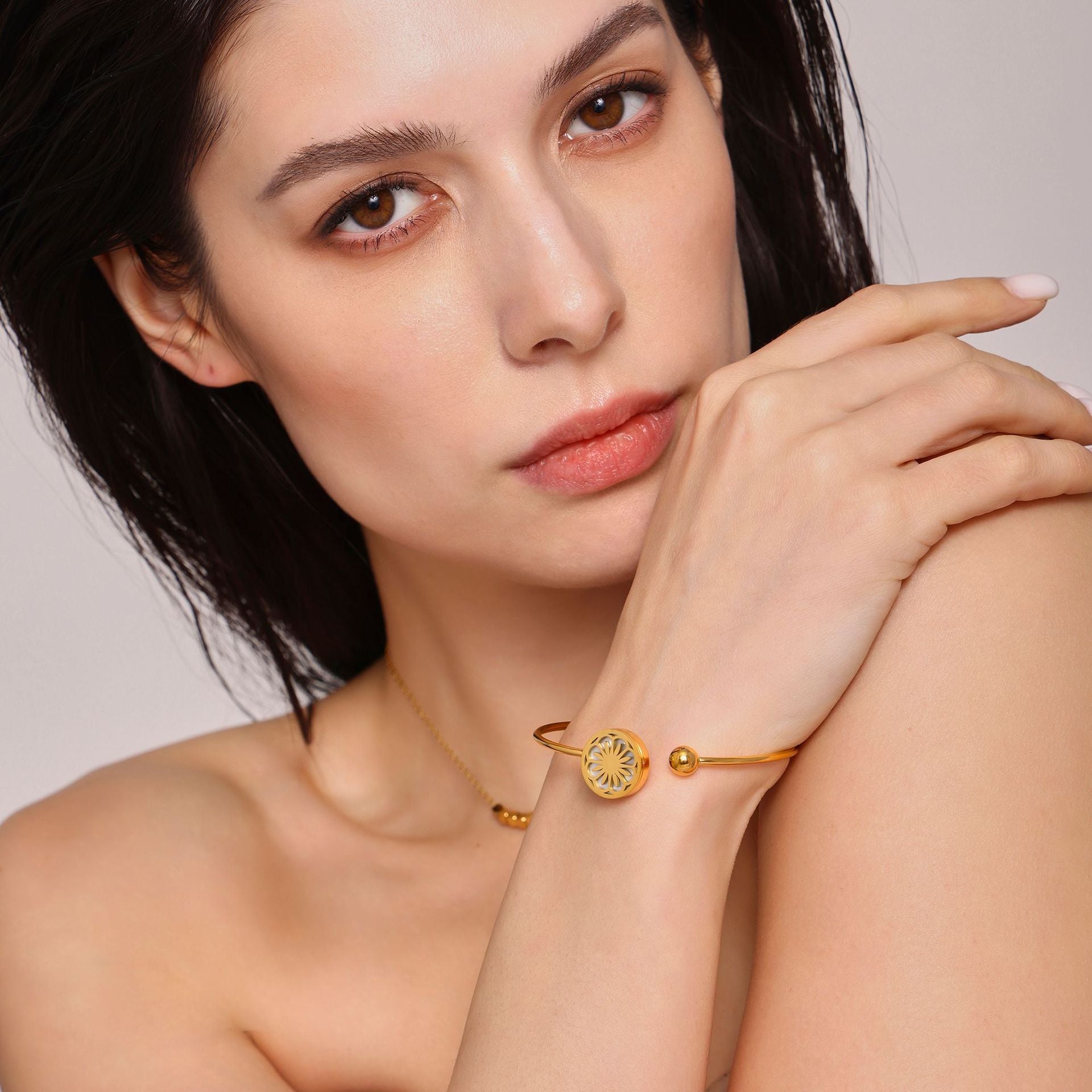 gold disc charm bracelet
