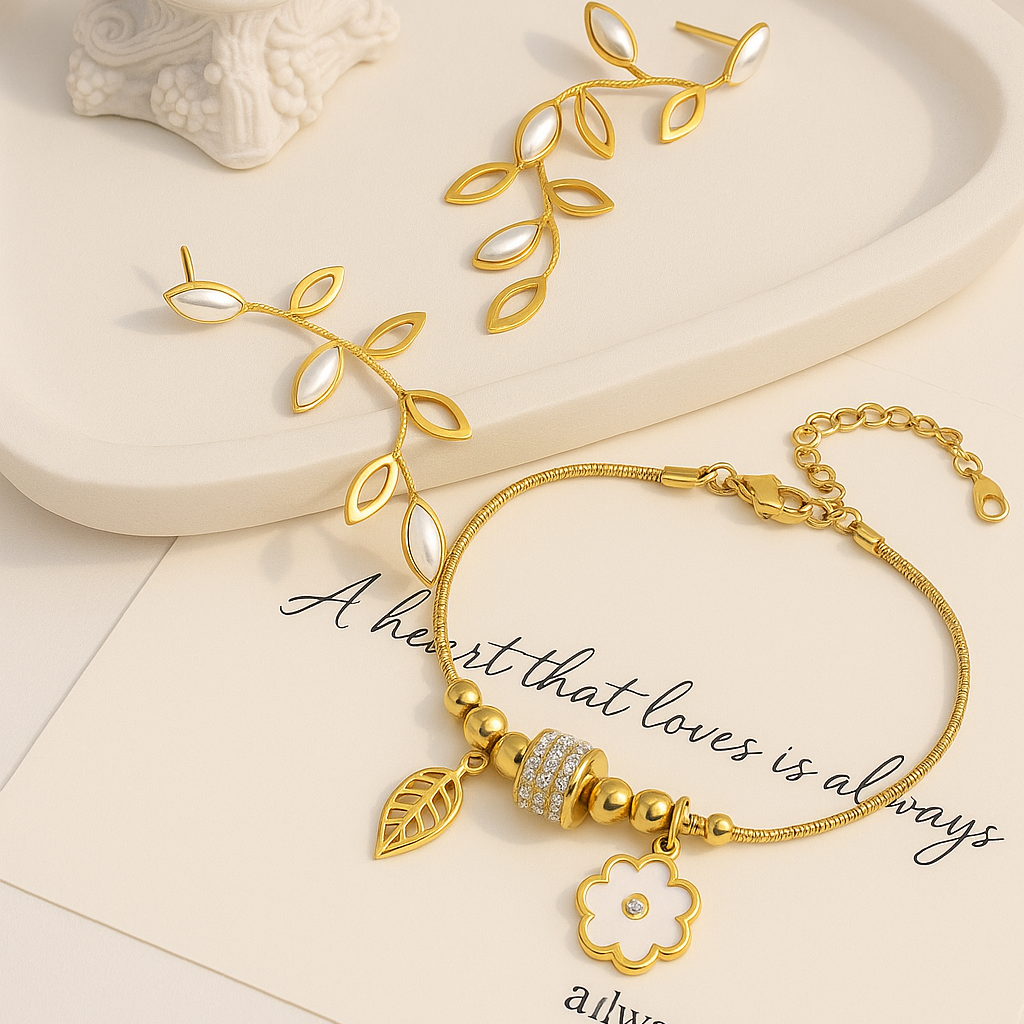 Gold bracelet with leaf designs on a white surface with a quote card.
